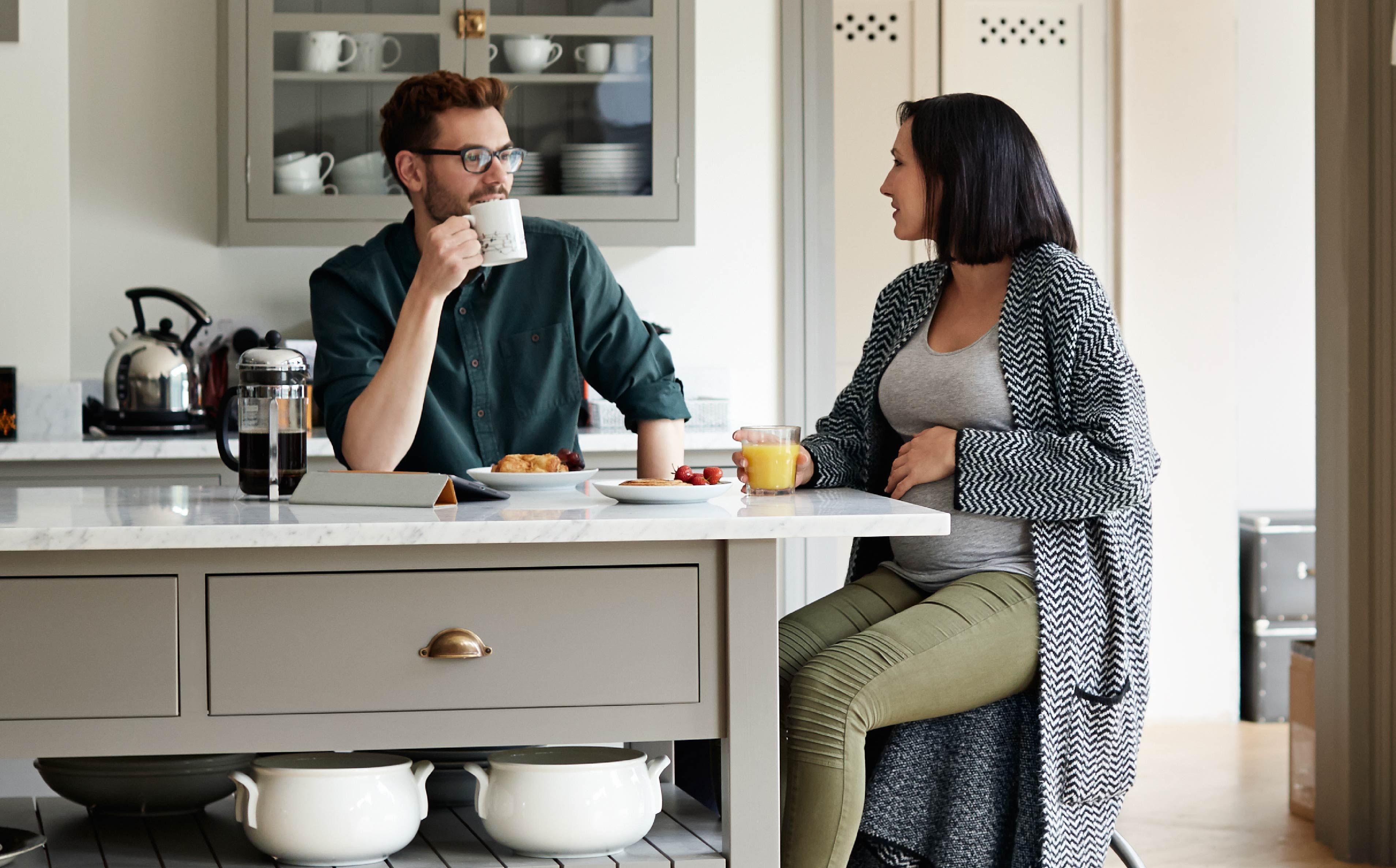 A young couple having breakfast together